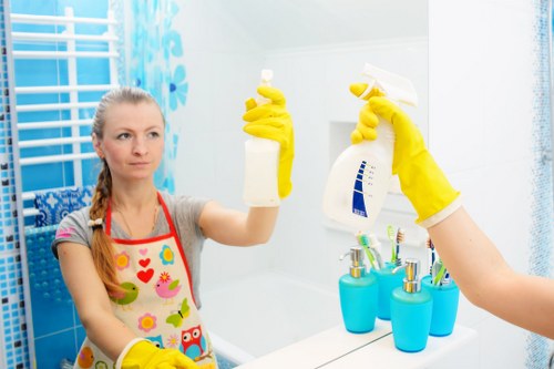 Cleaner preparing insured carpet cleaning equipment in Highbury