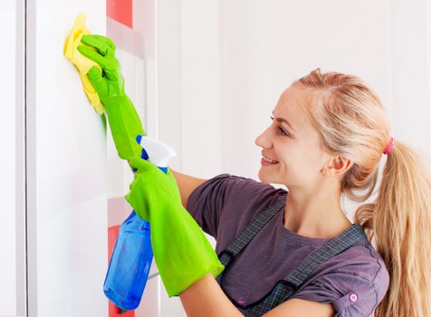 Carpet cleaning technician preparing equipment before a service appointment