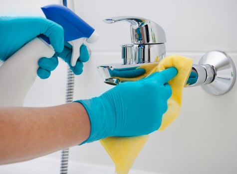 Office cleaning team maintaining hygiene in Highbury