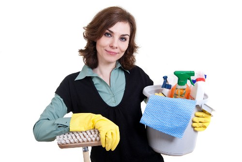 Highbury cleaning specialists performing deep cleaning in a kitchen and bathroom area